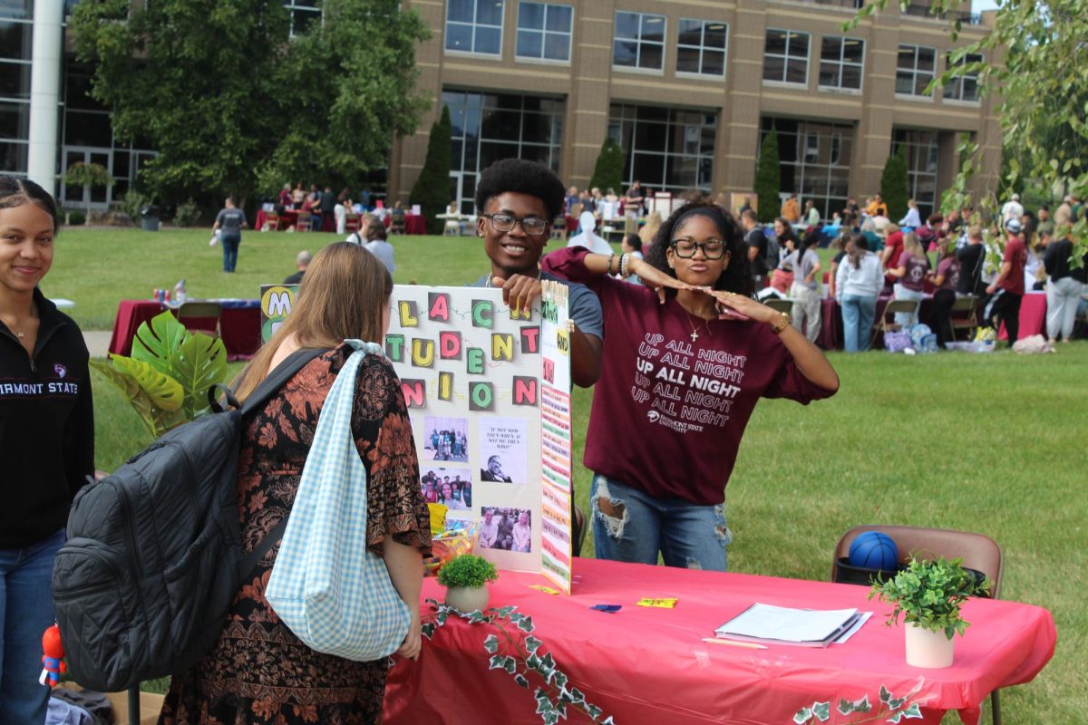 Members of the Black Student Union at Fairmont State University posing for a photo while talking to students Wednesday Aug. 27, 2025 in Fairmont, West Virginia.
