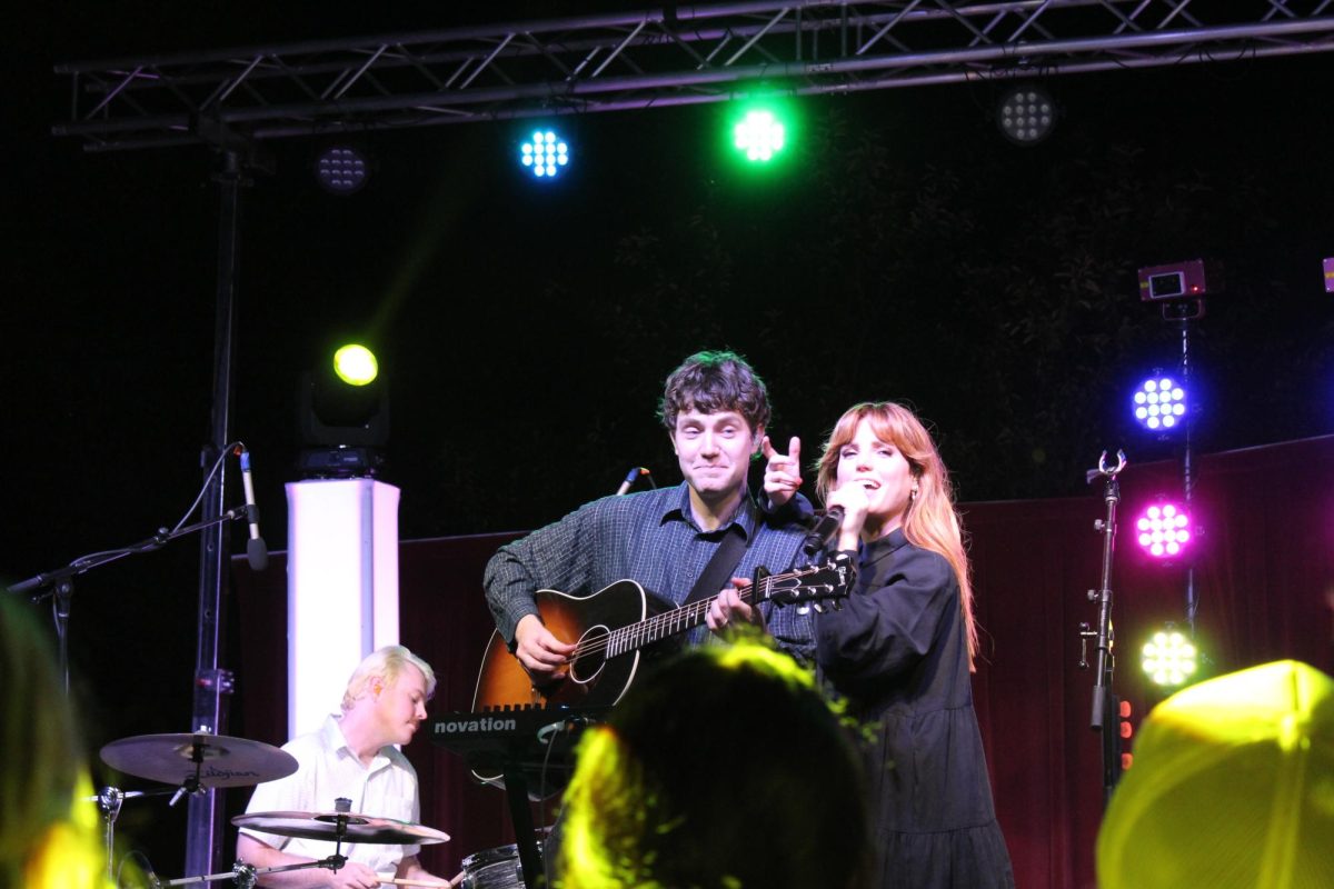 Noah Sierota and Sydney Quiseng of Echosmith singing a duet during a September 19, 2025 concert on the Falcon Center Quad.